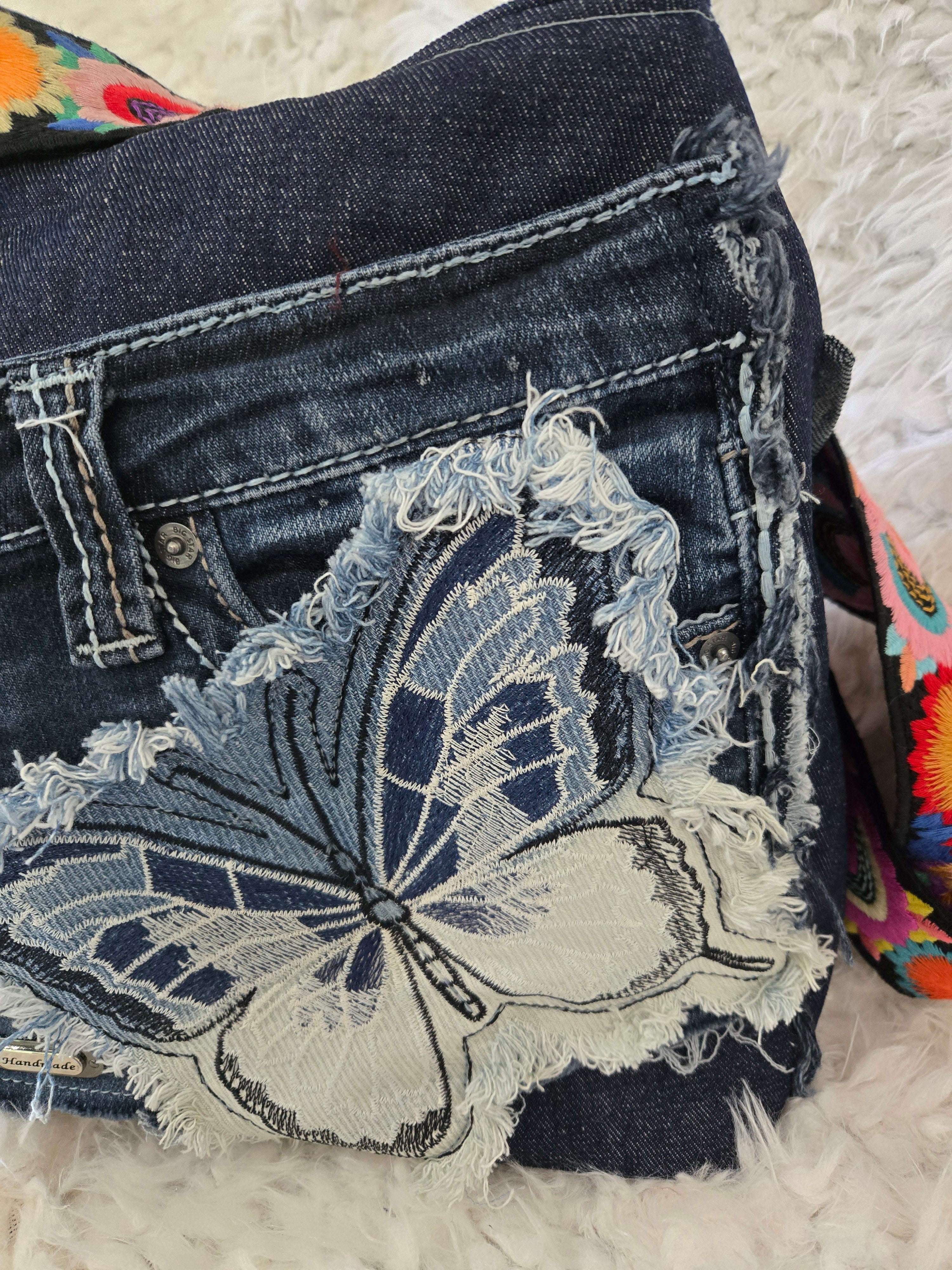 Handmade Jean purse with lots of pockets.