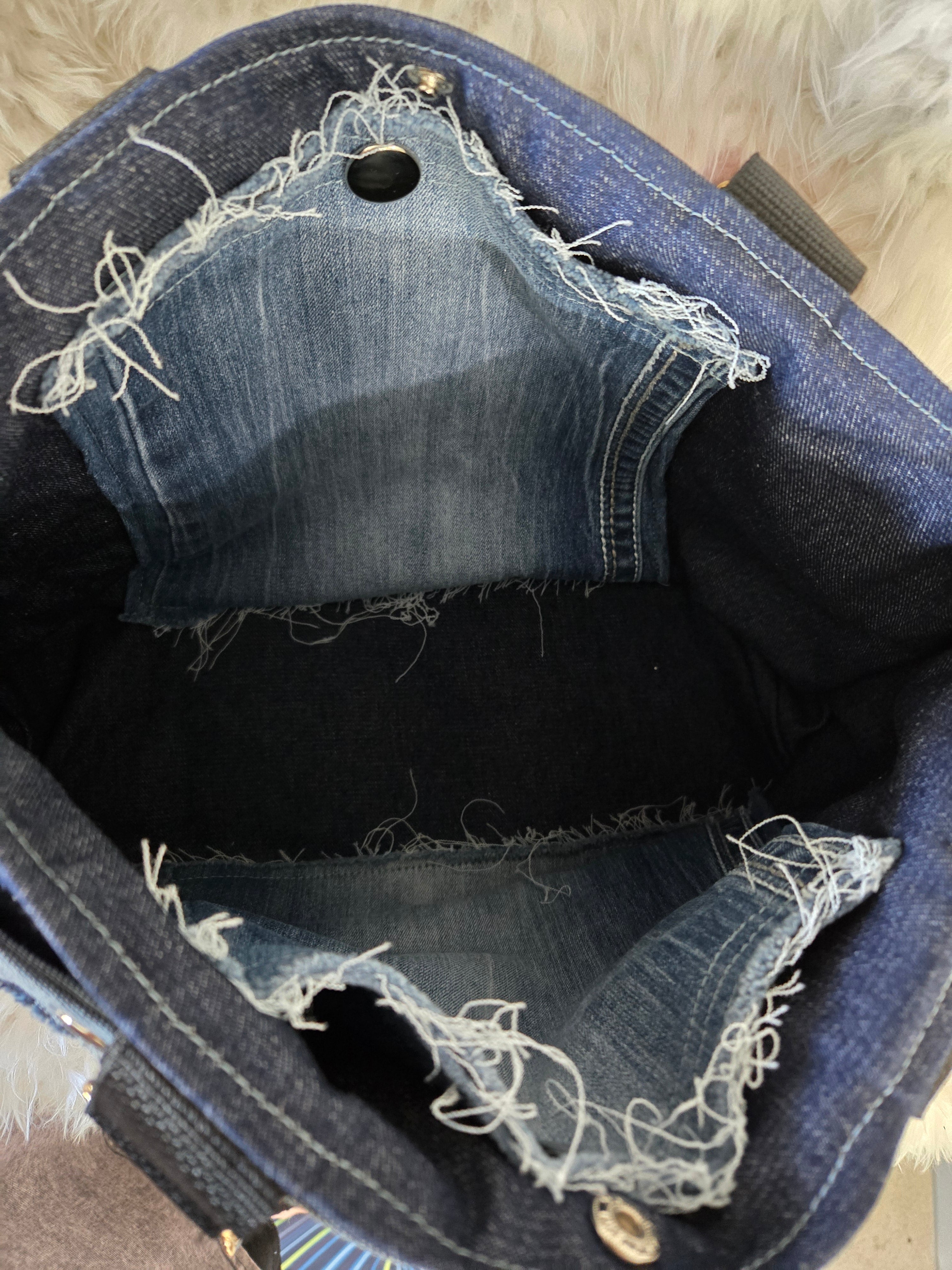 Handmade Jean purse with lots of pockets.