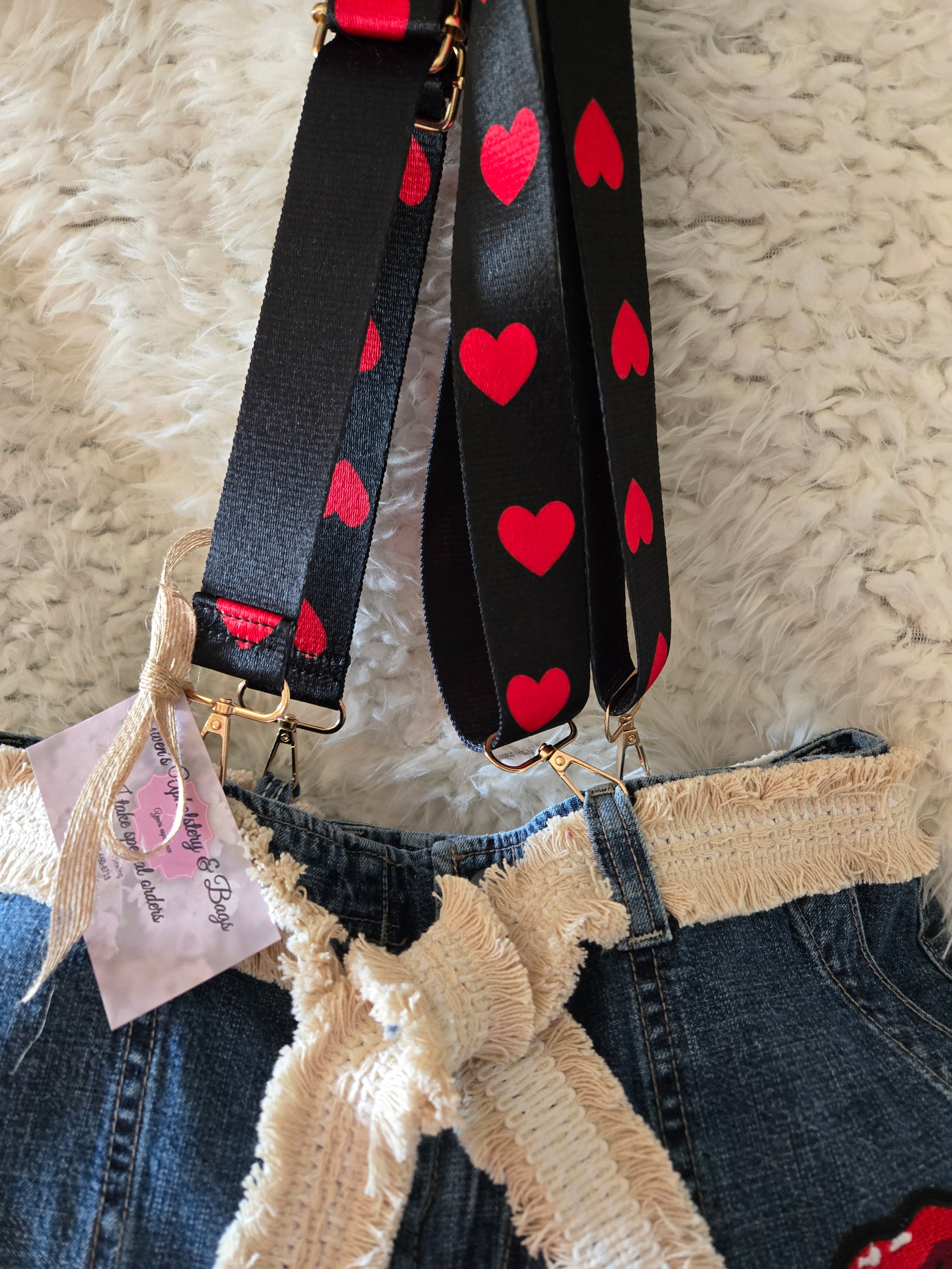 Handmade jean purse with lots of pockets on the outside with lots of red
