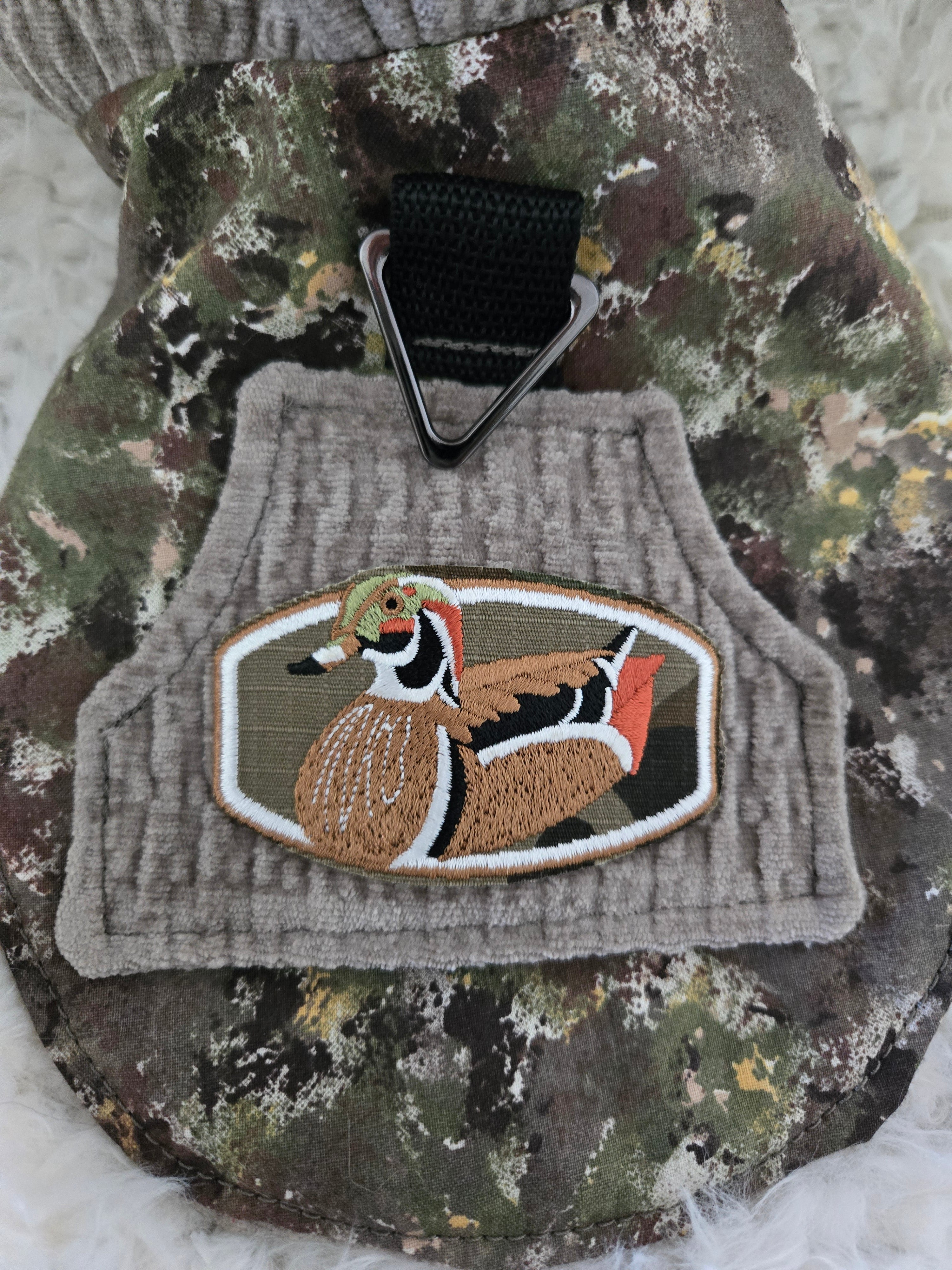 Camouflage and Gray pet carrier. Outfit and leash. For that little furry boy, he will love it. 4-6lbs. Size medium.