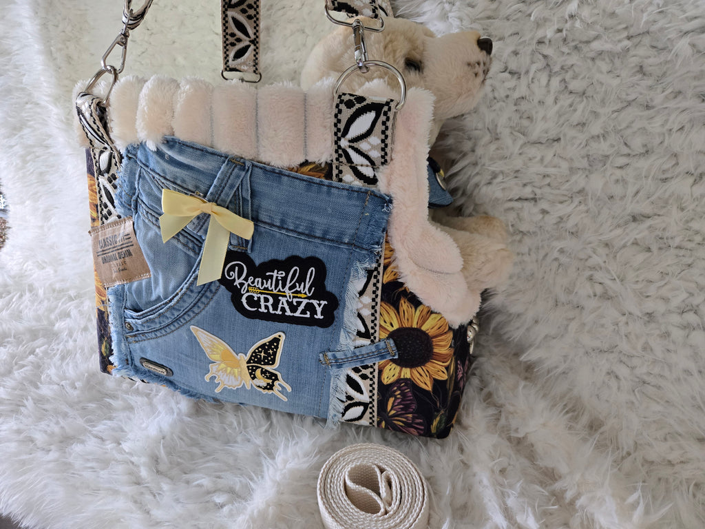 Medium to large dog carrier with sunflowers on fake Fur and Jean pockets. Manny pocket with crossbody straps, handmade in the USA