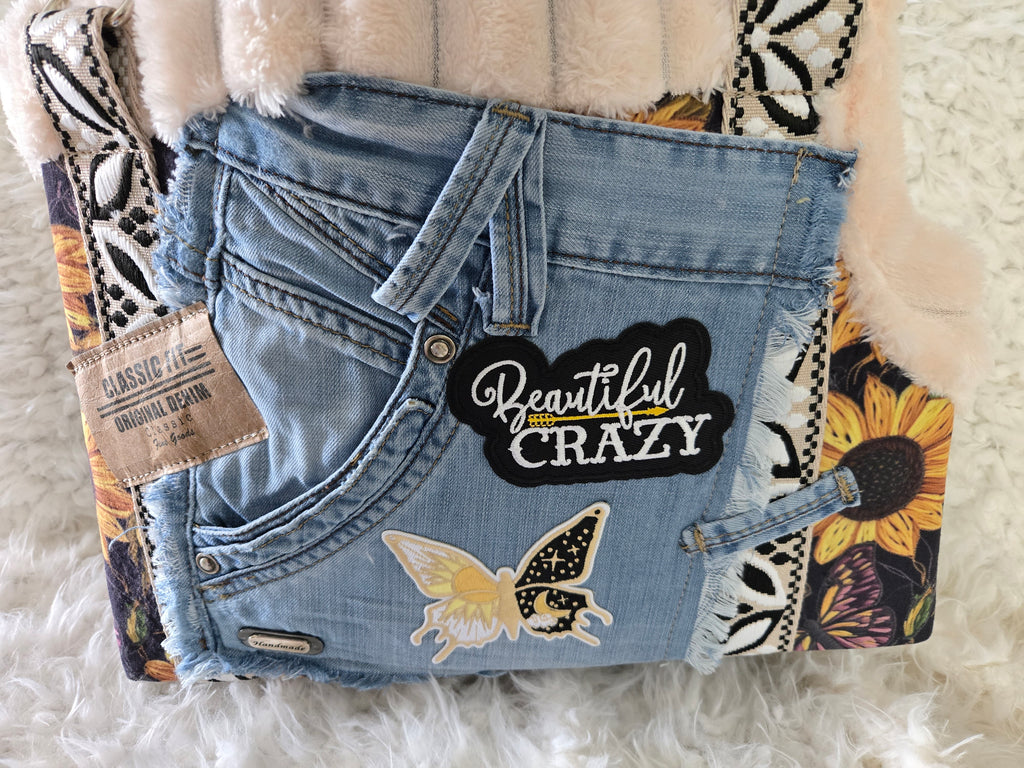 Medium to large dog carrier with sunflowers on fake Fur and Jean pockets. Manny pocket with crossbody straps, handmade in the USA