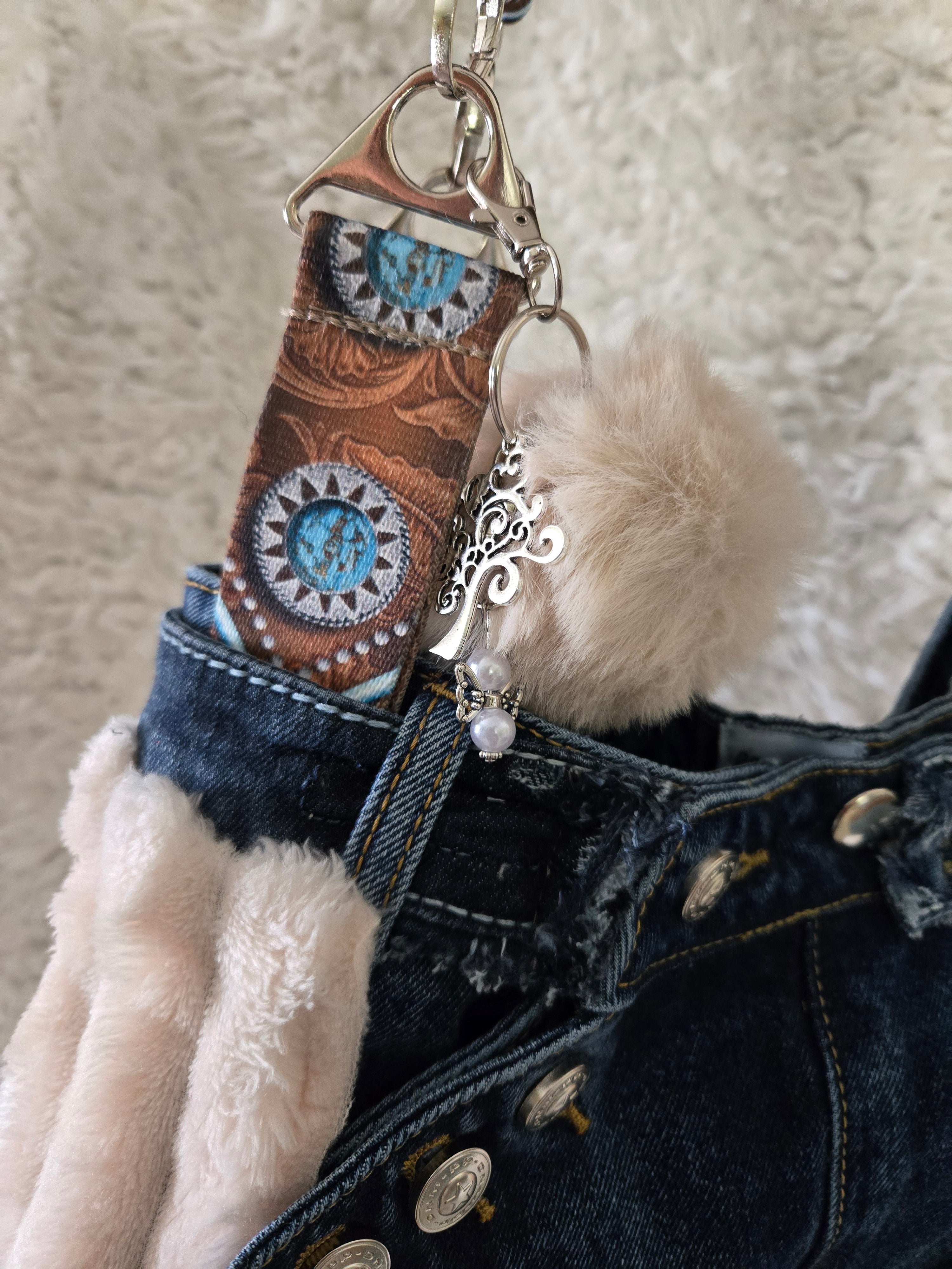 Jean purse with Fur and turquoise fringe embellishments, extremely cute. Medium to large size.