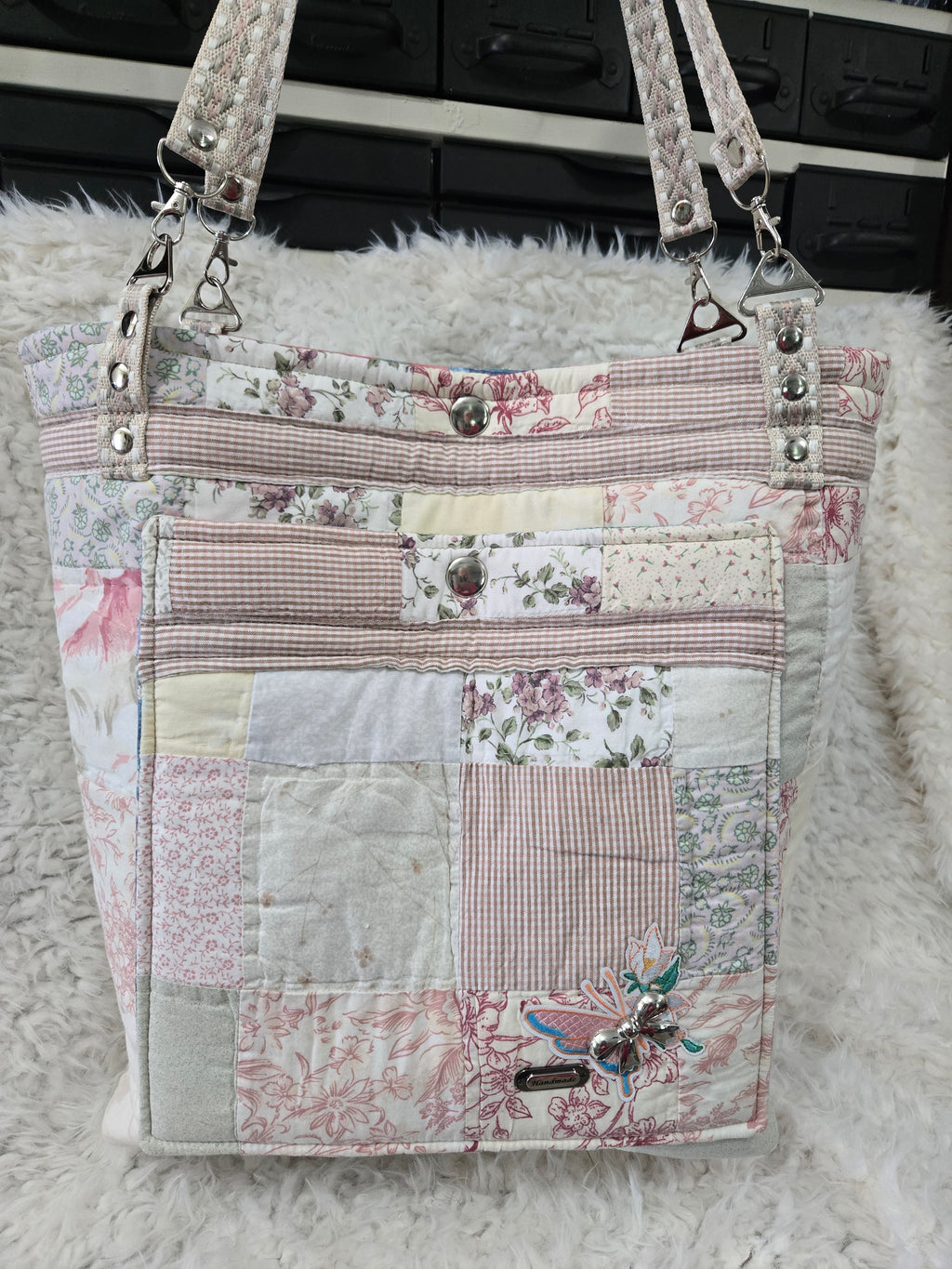 Large women's purse made from old quilt.