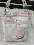 Large women's purse made from old quilt.