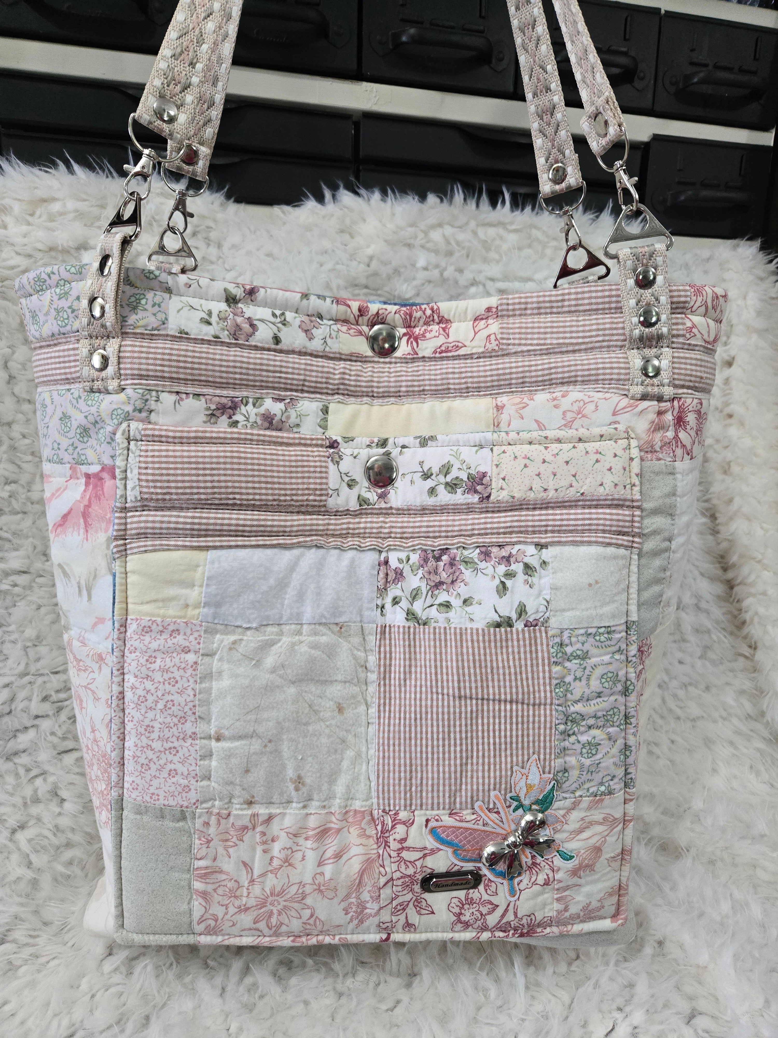 Large women's purse made from old quilt.