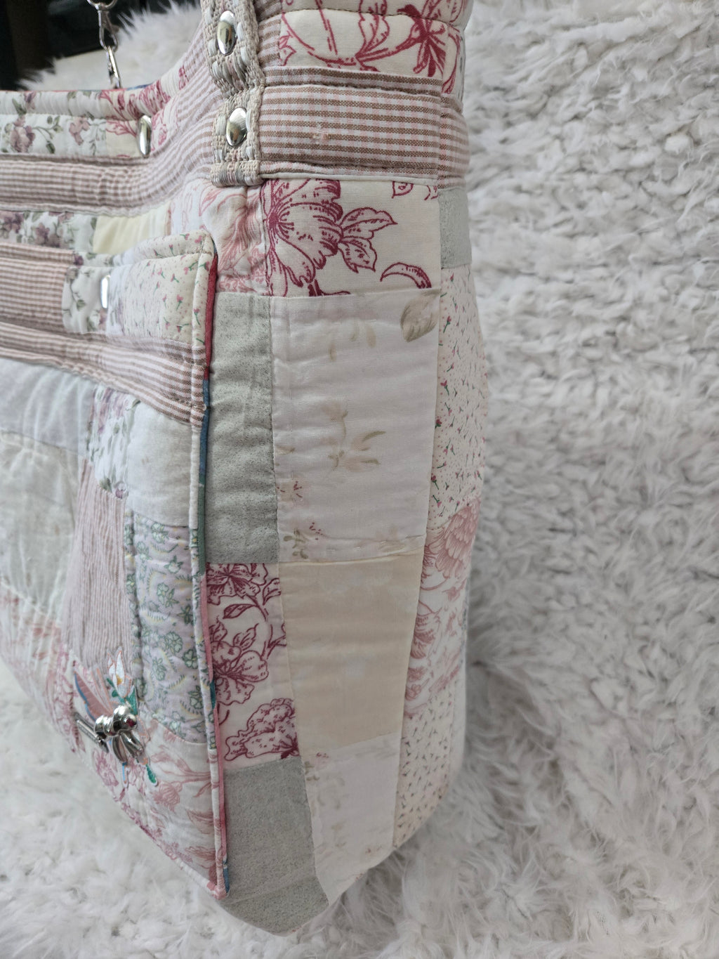 Large women's purse made from old quilt.