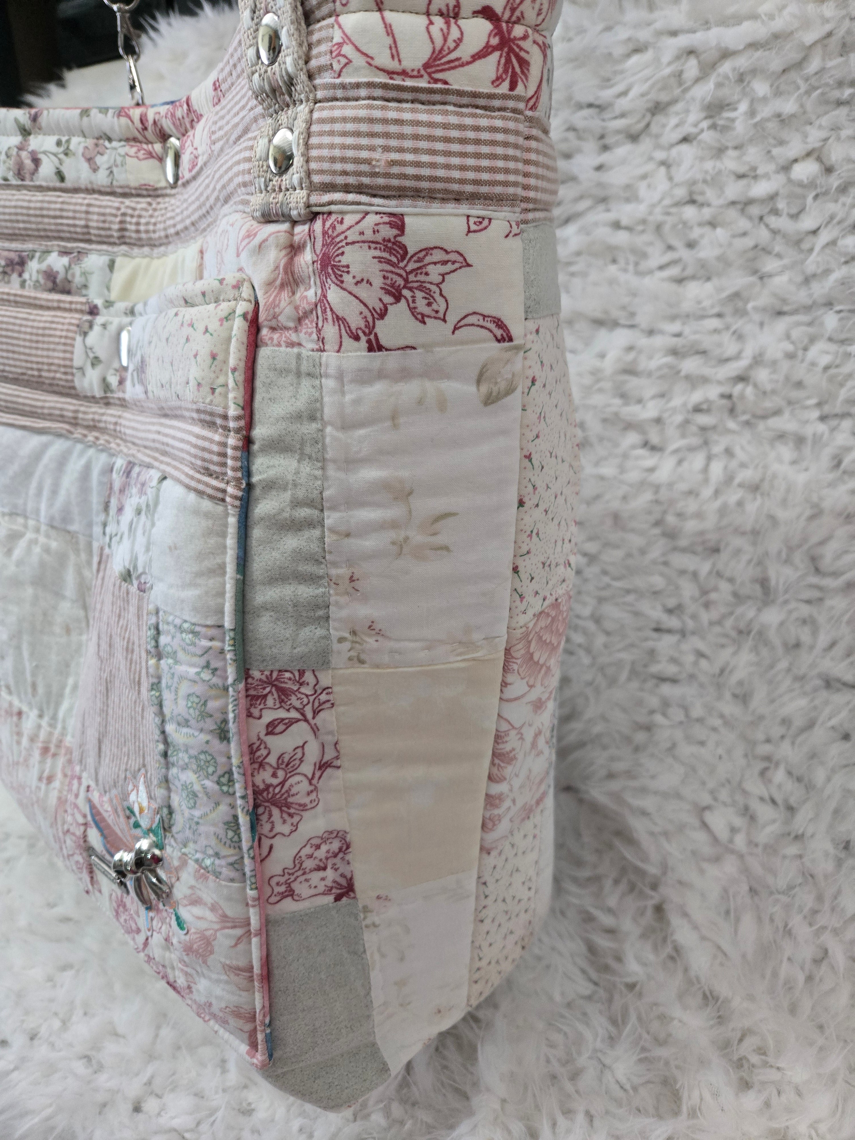 Large women's purse made from old quilt.
