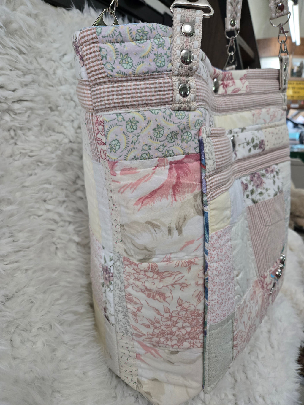 Large women's purse made from old quilt.