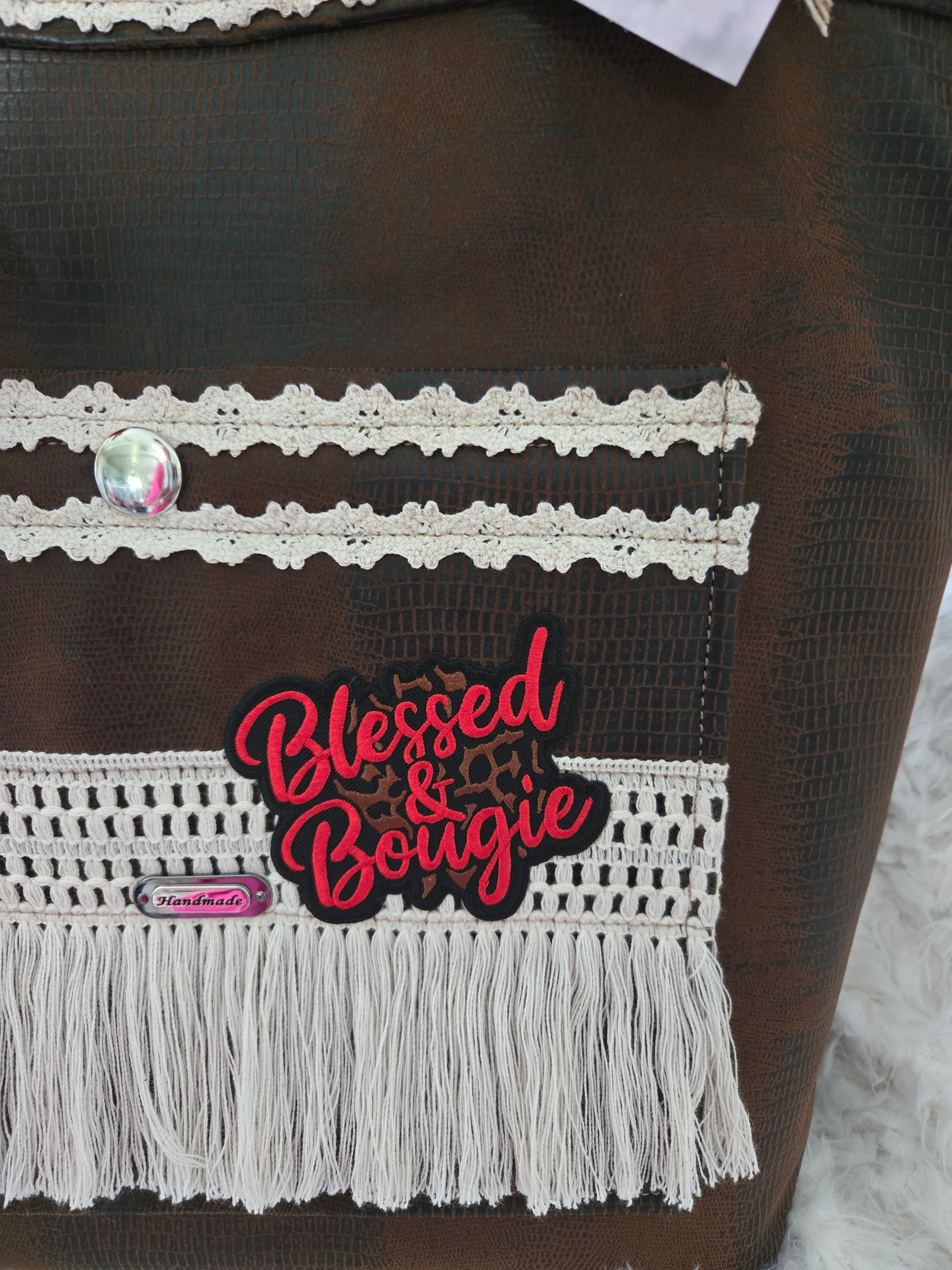 Faux leather bag extremely soft. Feel looks just like leather, large bag for women purse.