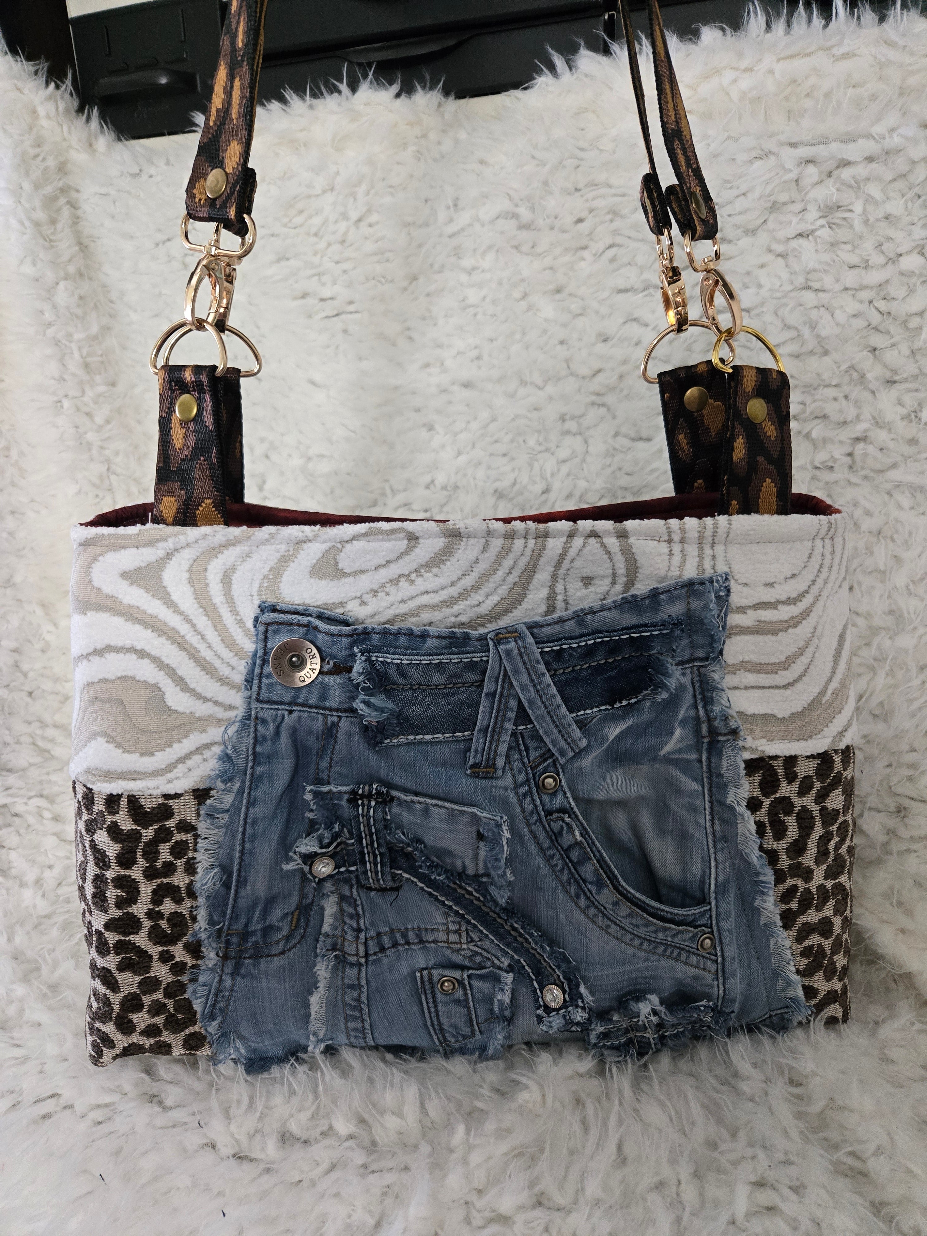 Cheetah and Jean purse handbag. So I say, size 16, / 12.