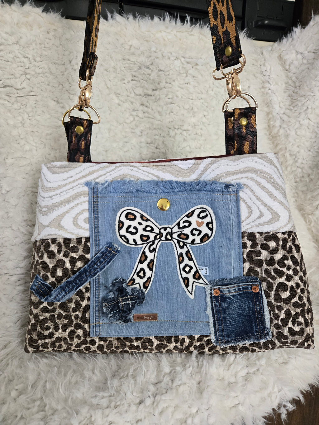 Cheetah and Jean purse handbag. So I say, size 16, / 12.
