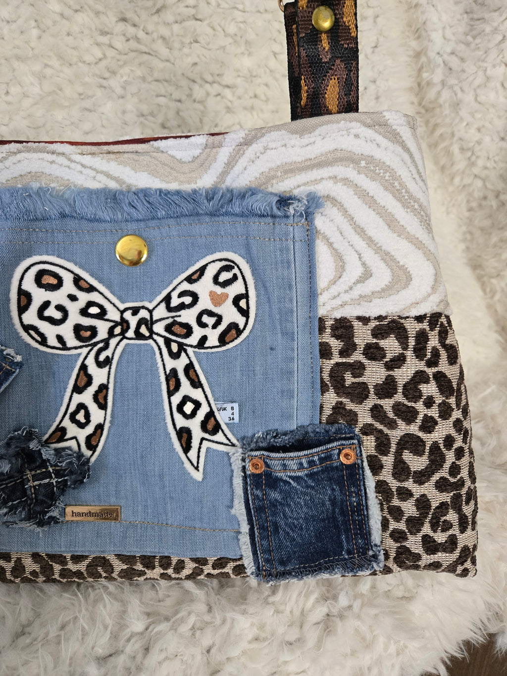 Cheetah and Jean purse handbag. So I say, size 16, / 12.