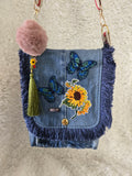 Blue Jean and sunflower across body purse handmaid.