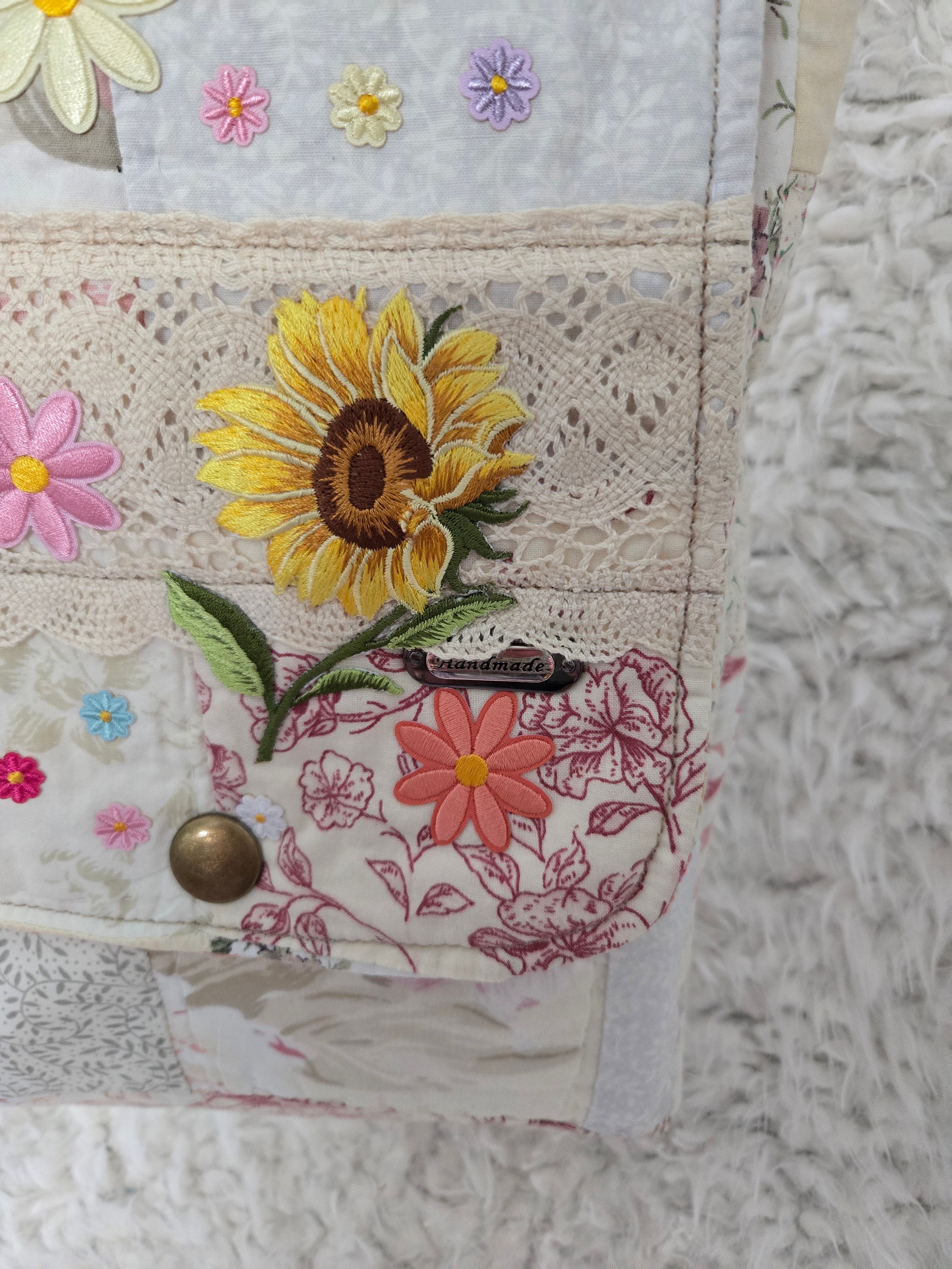 Handmade boho, body strap cross body made with an old quilt. Absolutely beautiful.