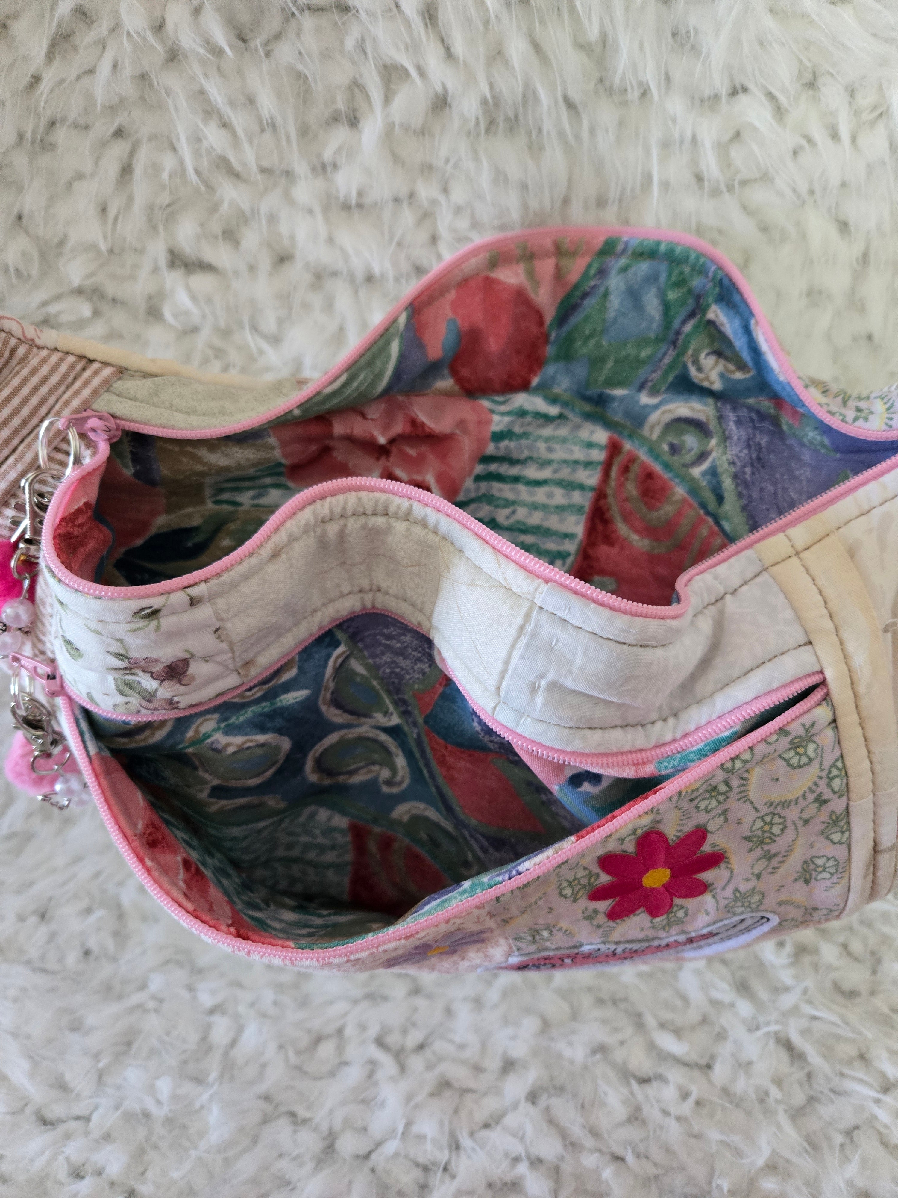 Fanny pack bum bag from a repurposed, old quilt. Pinks and other colors.