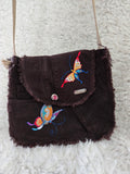 Brown denim, small purse handbag. With butterfly embellishments, vibrantly colored.