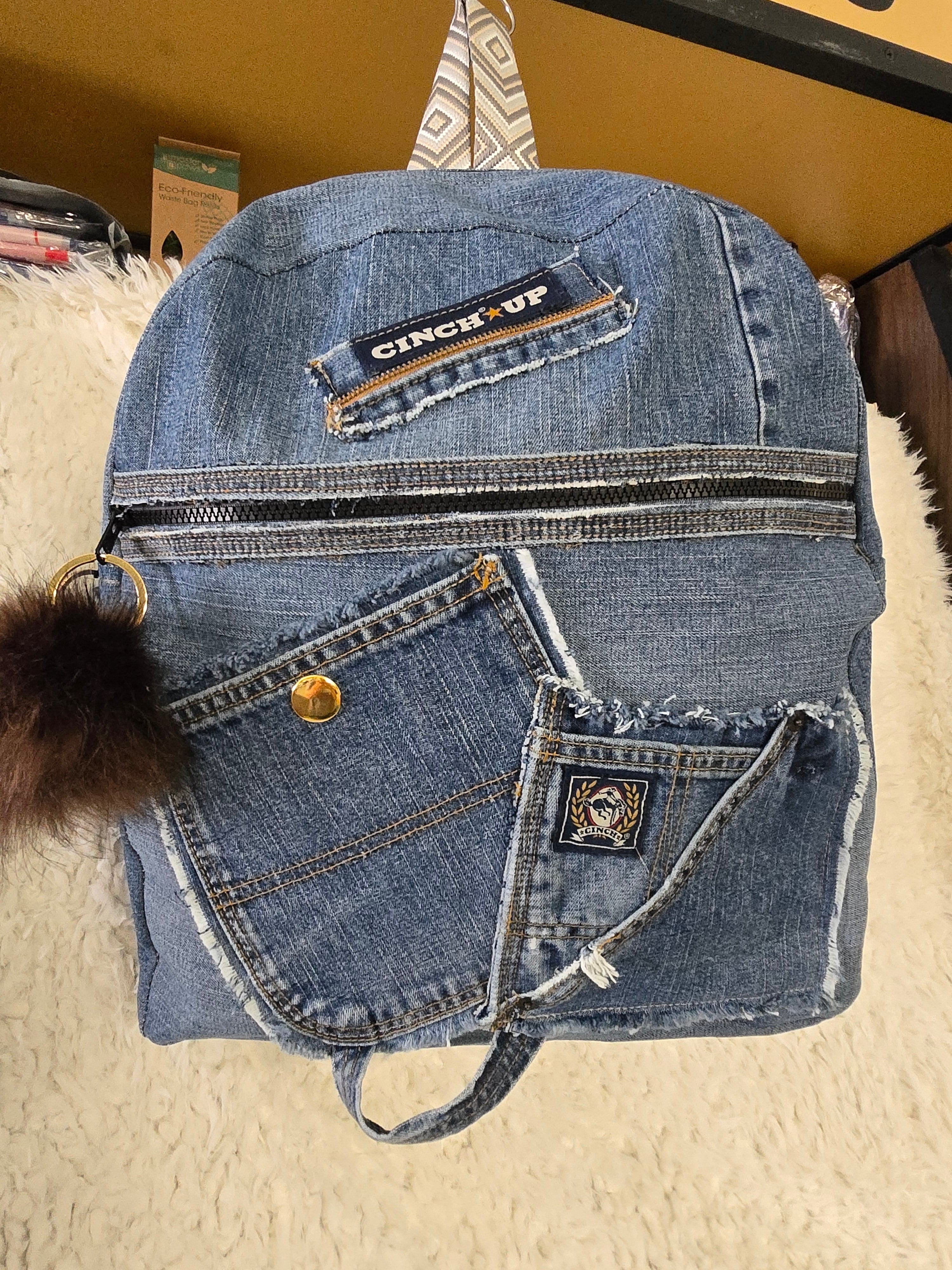 Handmade blue jean backpack with lots of pockets, large