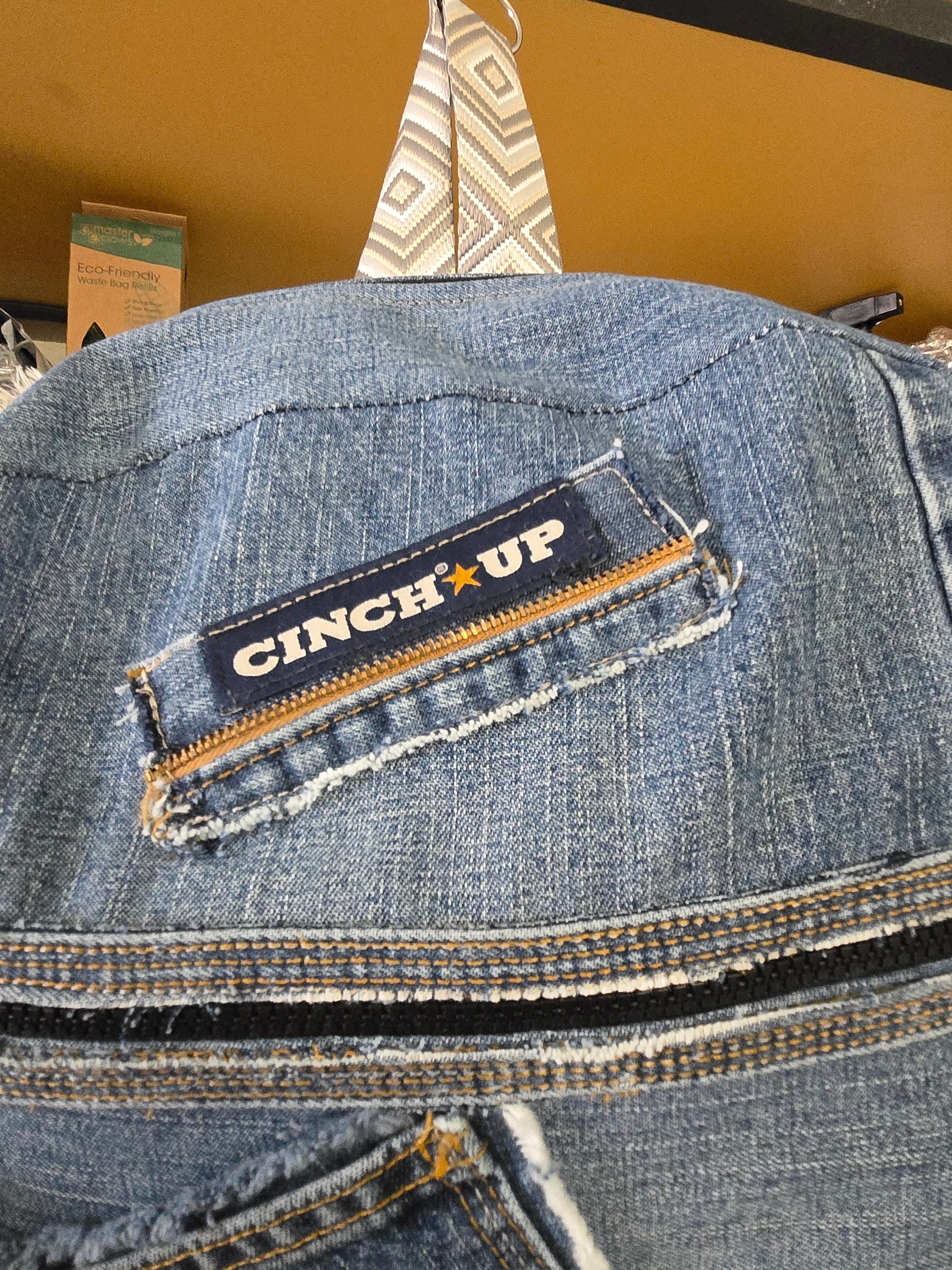Handmade blue jean backpack with lots of pockets, large