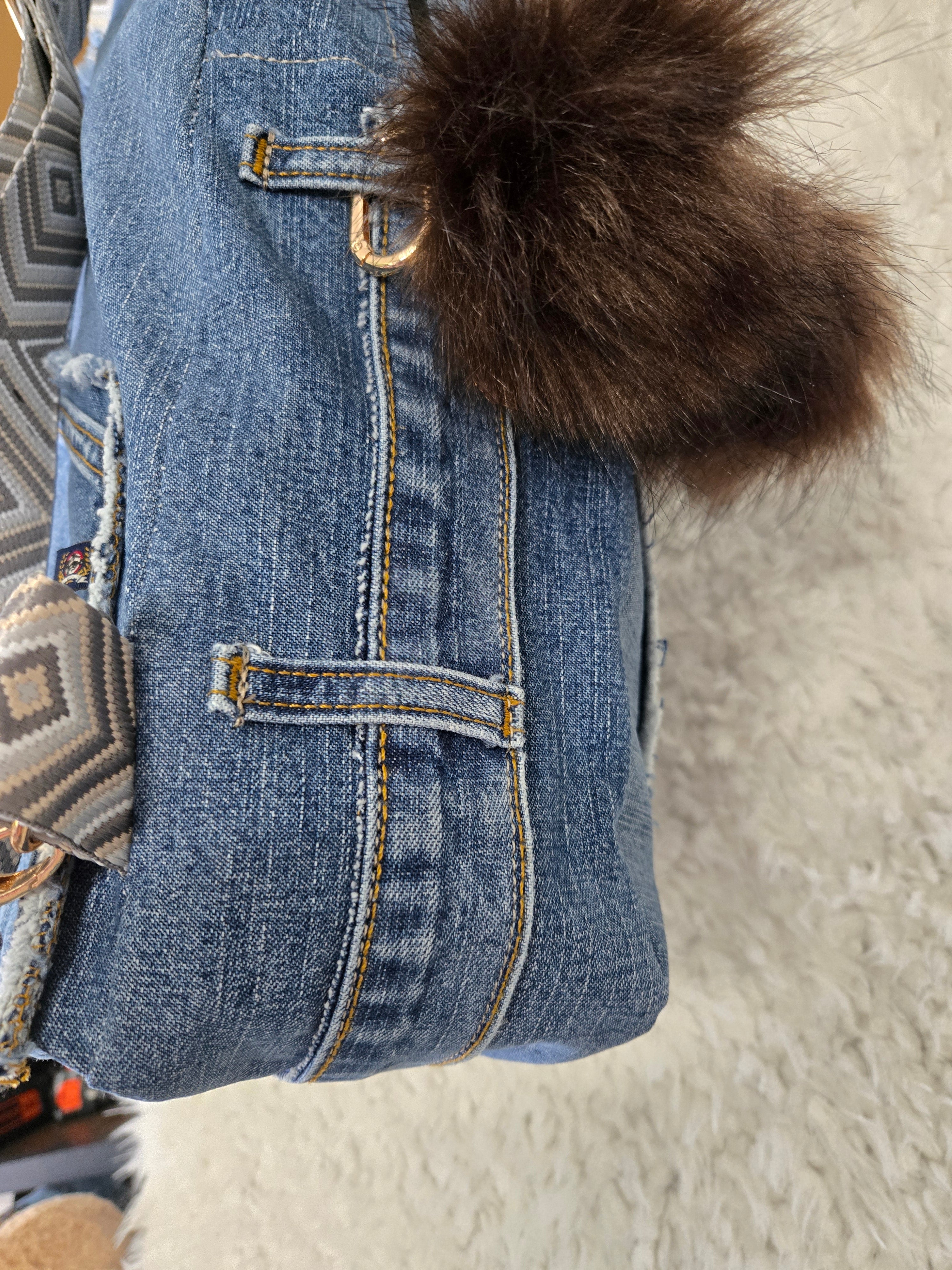 Handmade blue jean backpack with lots of pockets, large