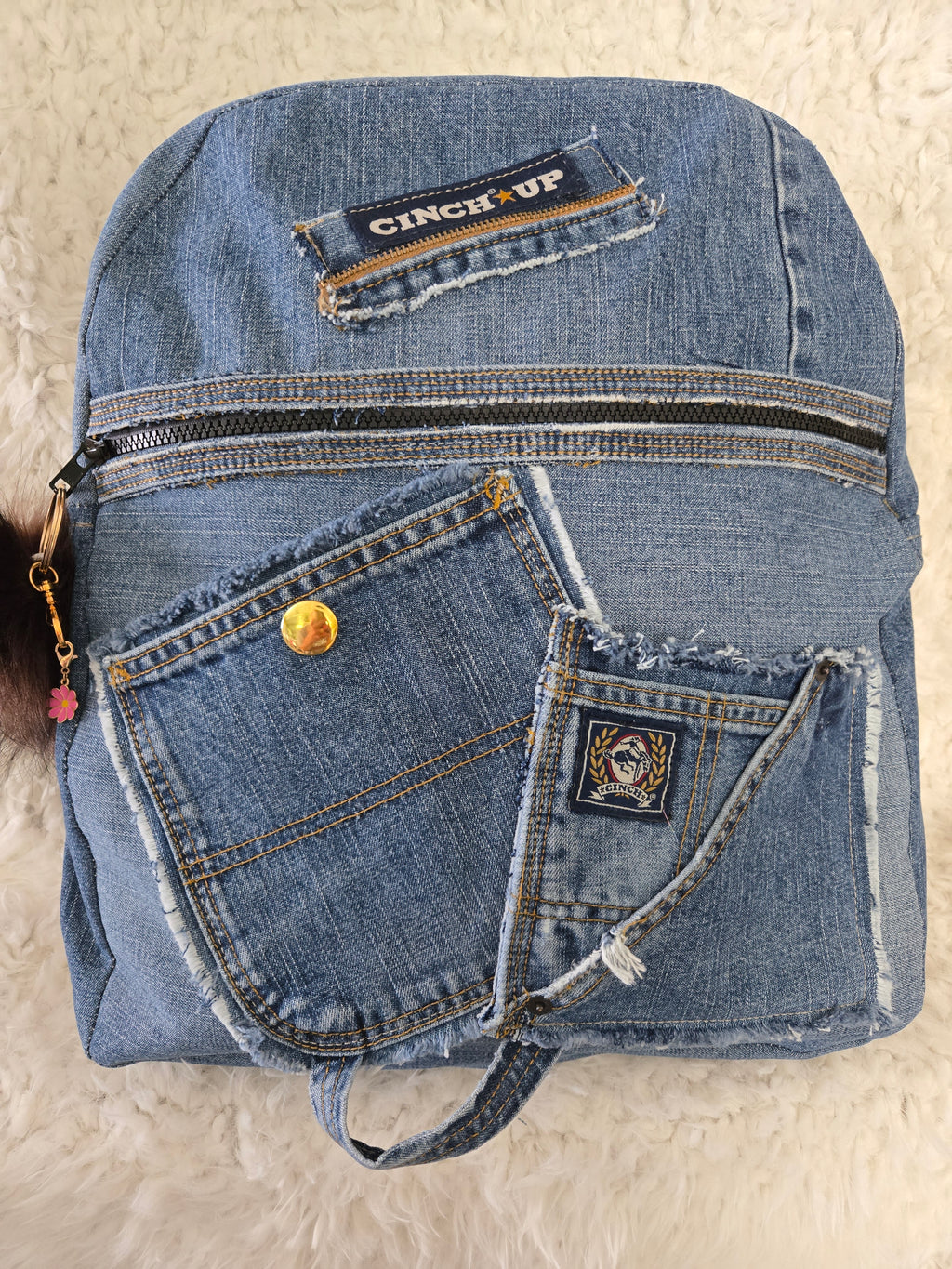 Handmade blue jean backpack with lots of pockets, large