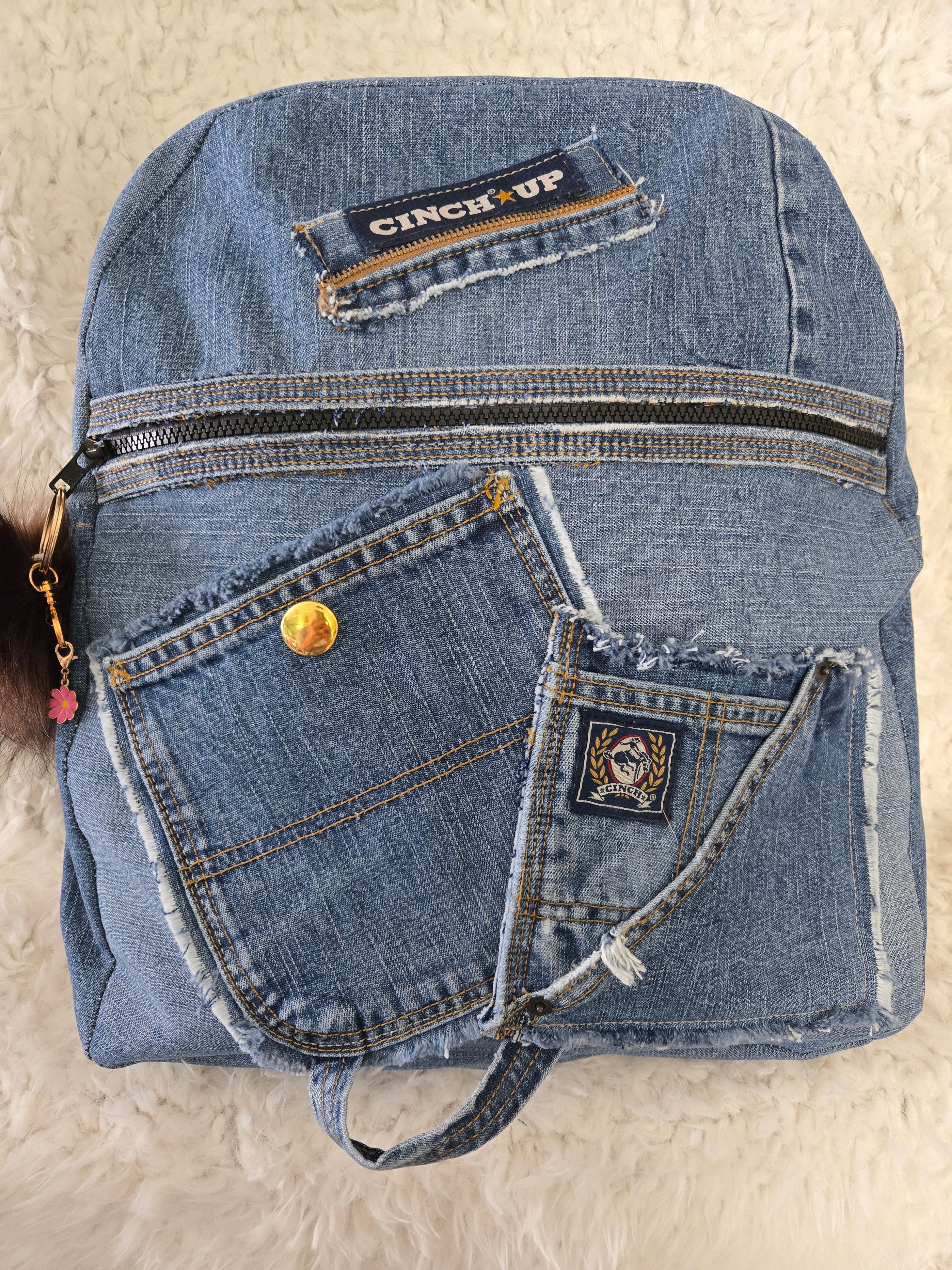 Handmade blue jean backpack with lots of pockets, large