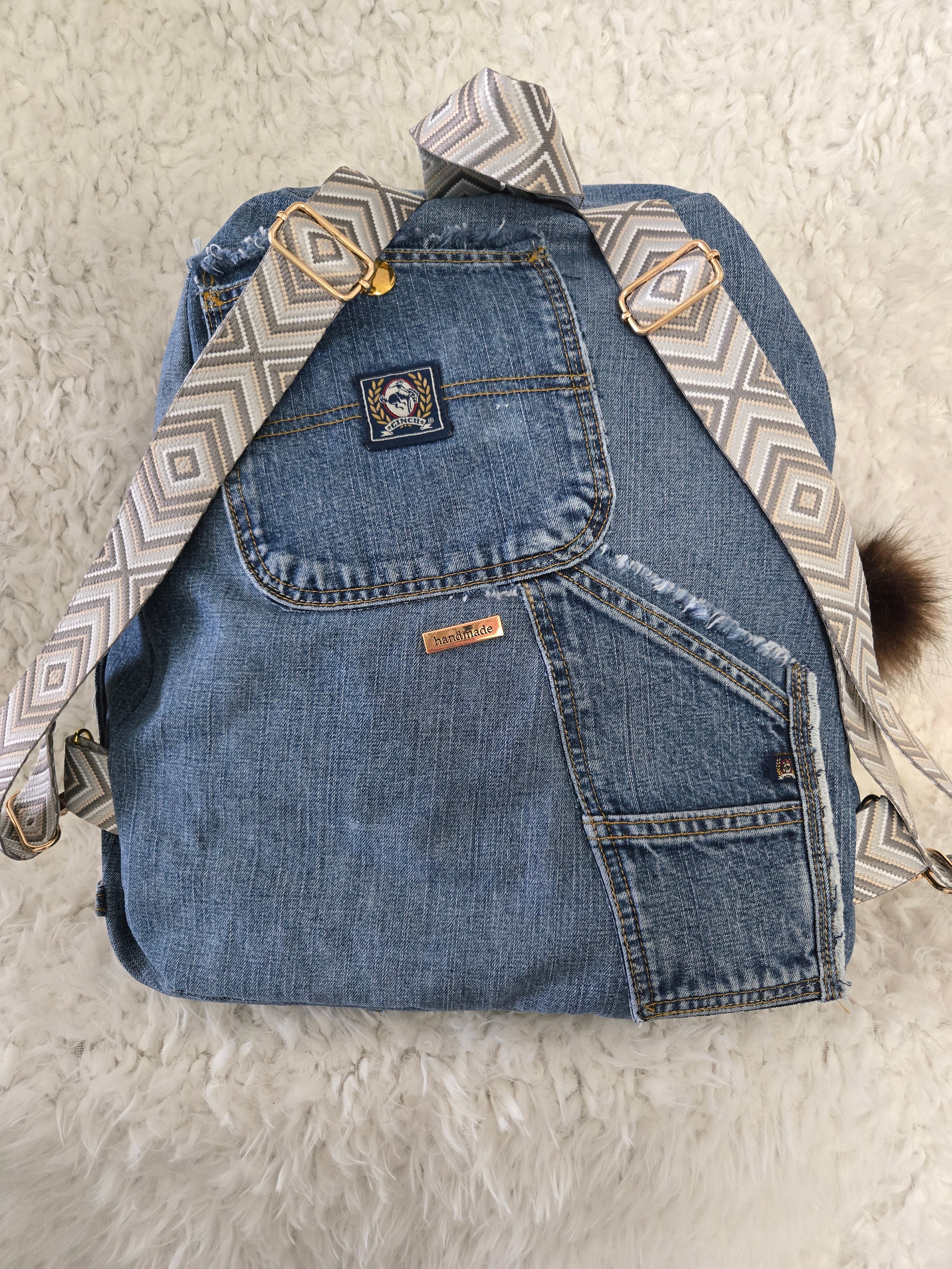 Handmade blue jean backpack with lots of pockets, large