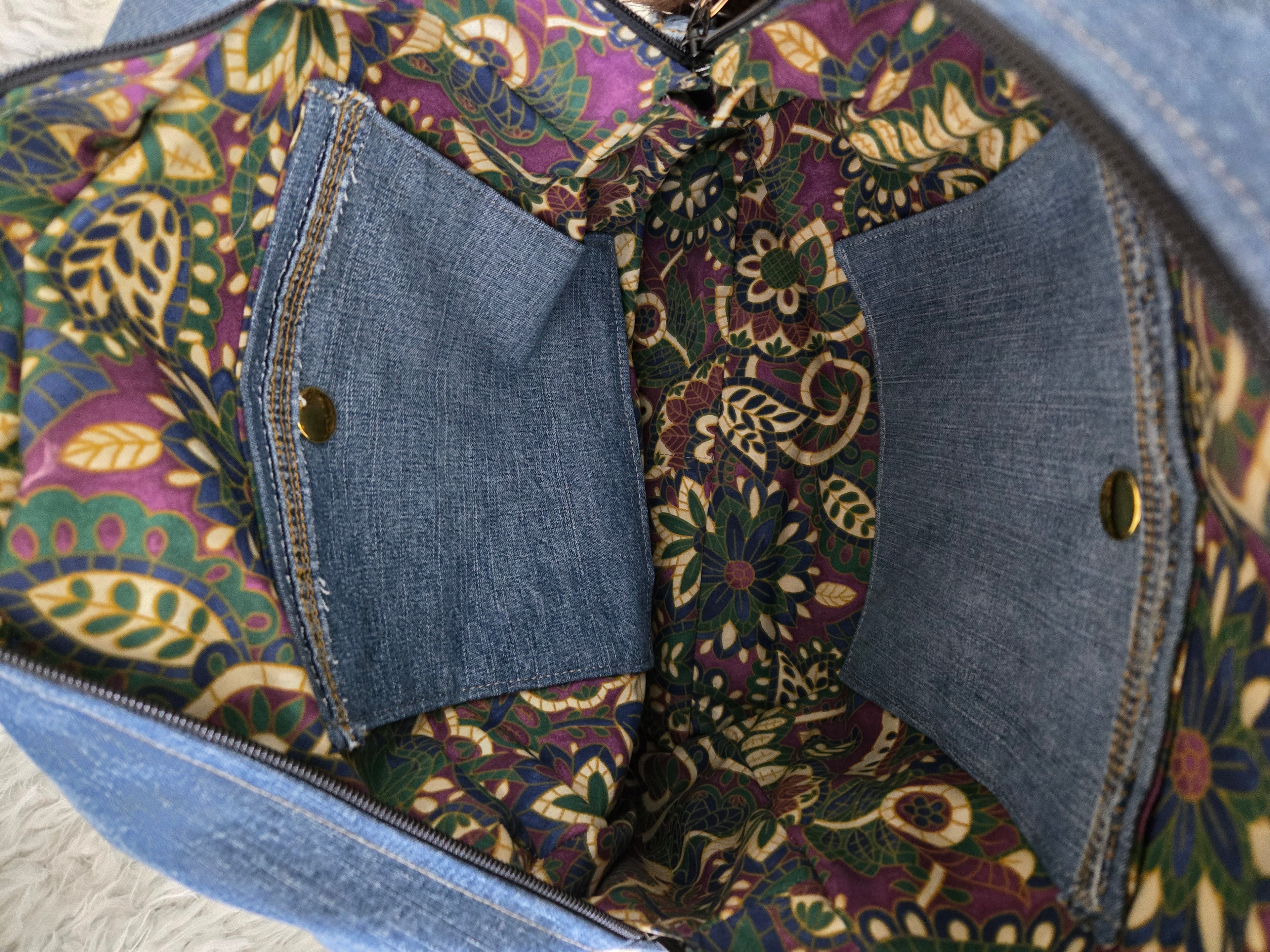Handmade blue jean backpack with lots of pockets, large